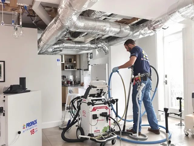 Uxbridge Air Duct Cleaning technician performing advanced pure duct cleaning with specialized equipment in Uxbridge