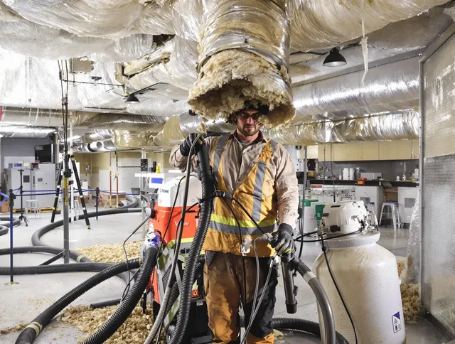 Professional vacuum insulation removal by Uxbridge Air Duct Cleaning expert in Uxbridge